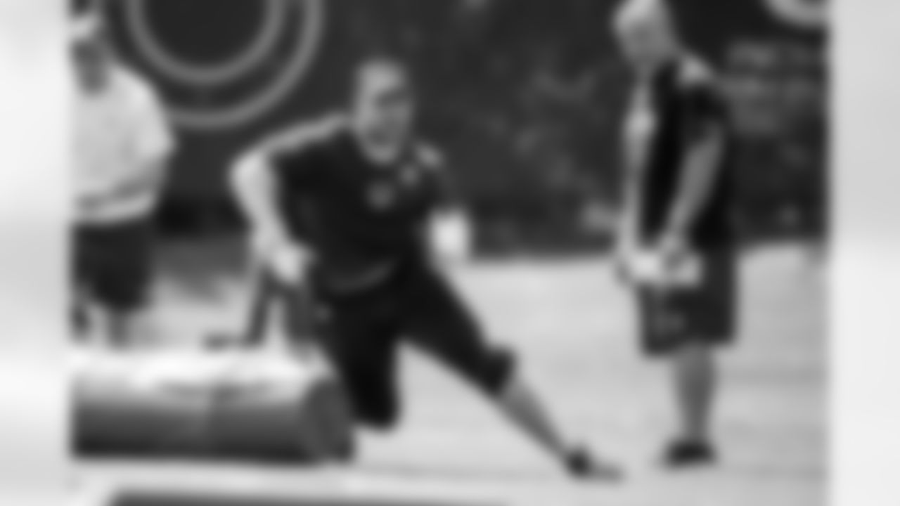 DE Laiatu Latu #97 and Charlie Partridge Defensive Line