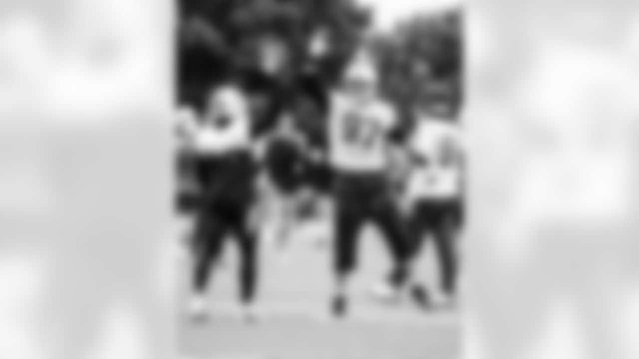 DE Laiatu Latu #97 and CB Kenny Moore II #23