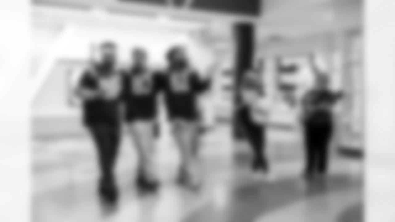 LB Austin Ajiake #58, WR Eli Pancol#83, DE Viliami Fehoko Jr.#61 and Allison B.