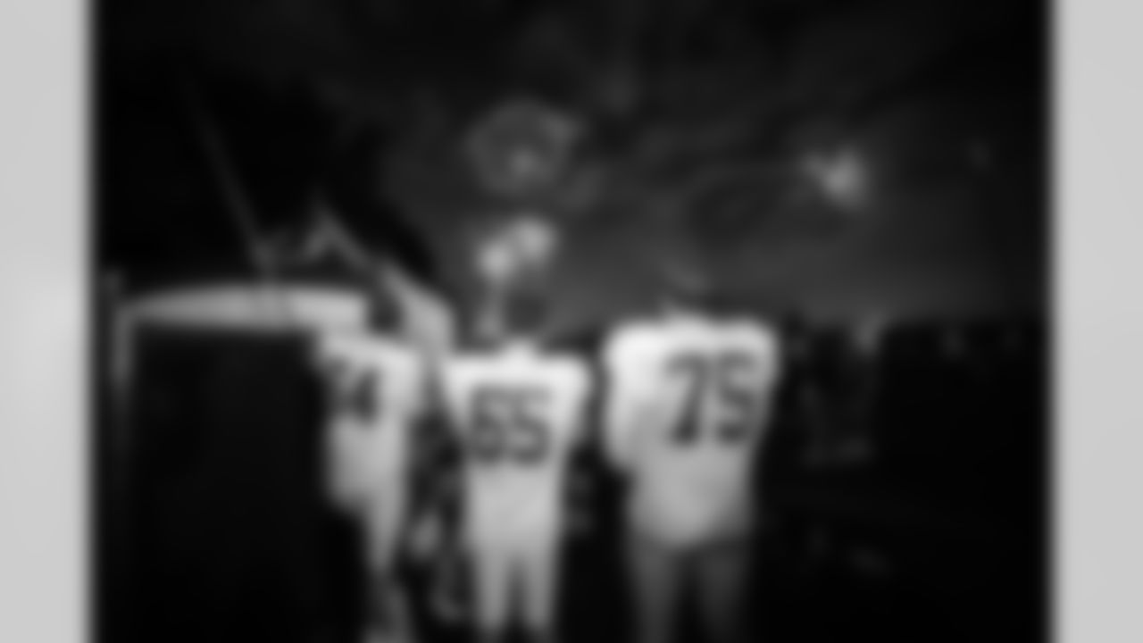 T Marshall Foerner #64, C Mose Vavao #67 and T Jalen Travis #75