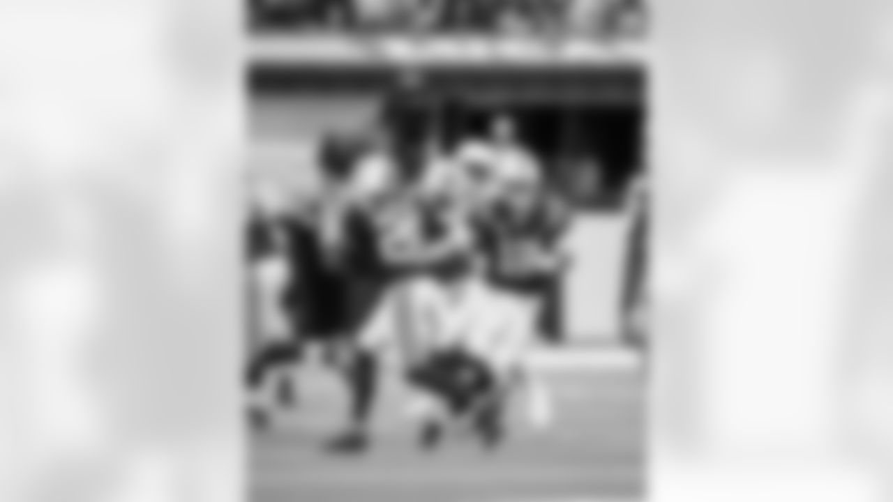 RB Jonathan Taylor #28 and QB Daniel Jones #17