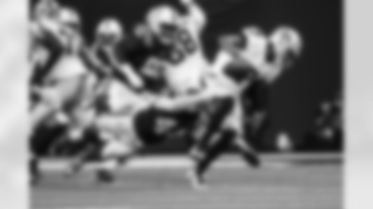 LB Zaire Franklin #44 and DT Neville Gallimore #92