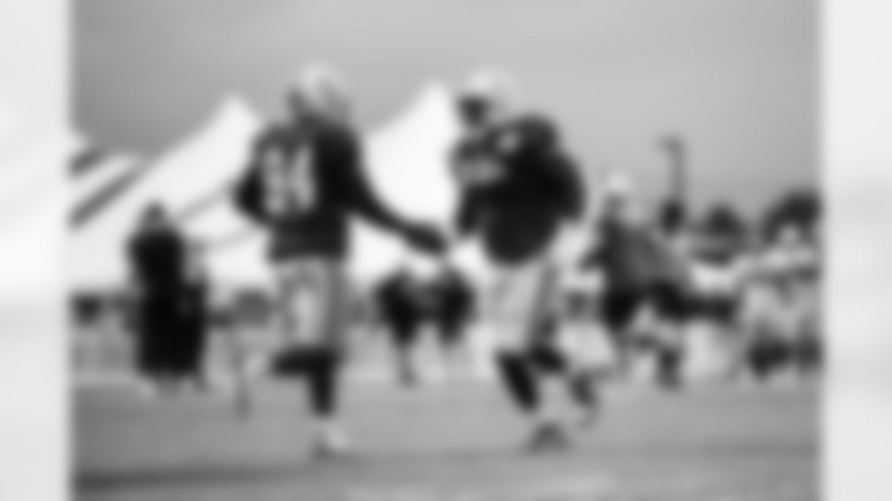DE Tyquan Lewis #94 and DT Neville Gallimore #92
