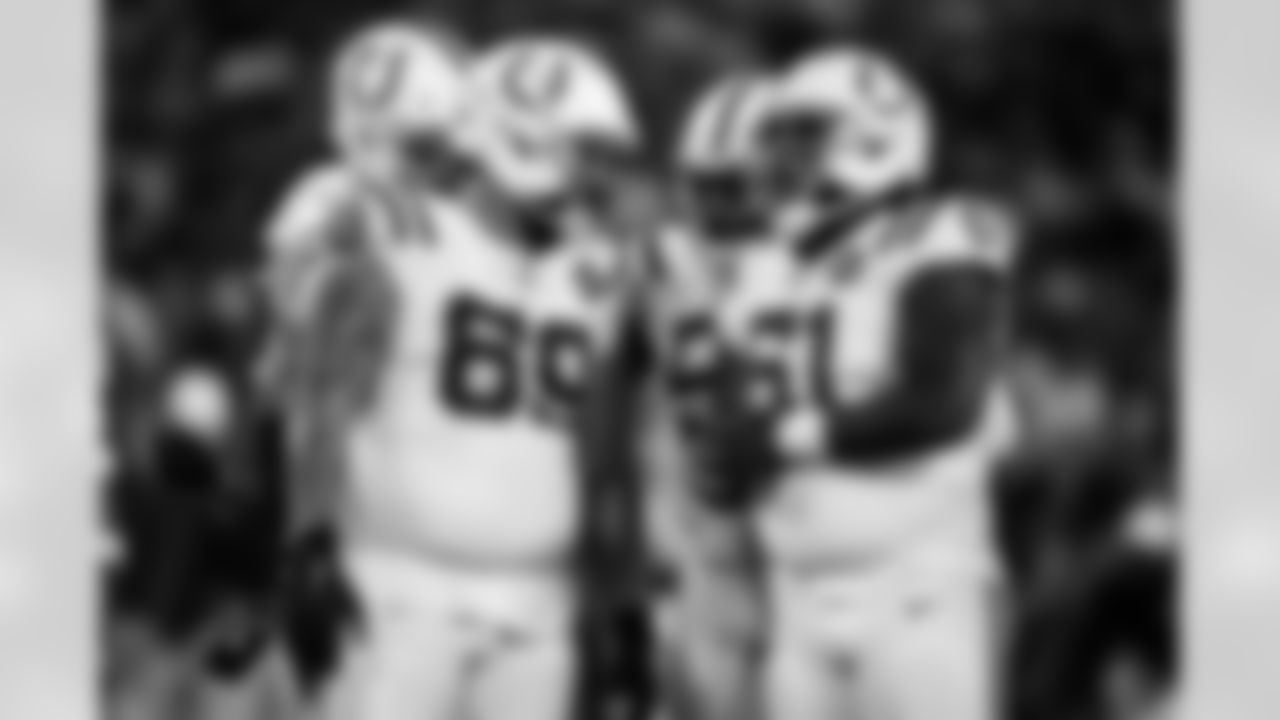 DT Josh Tupou #69 and DT Devonta Davis #61