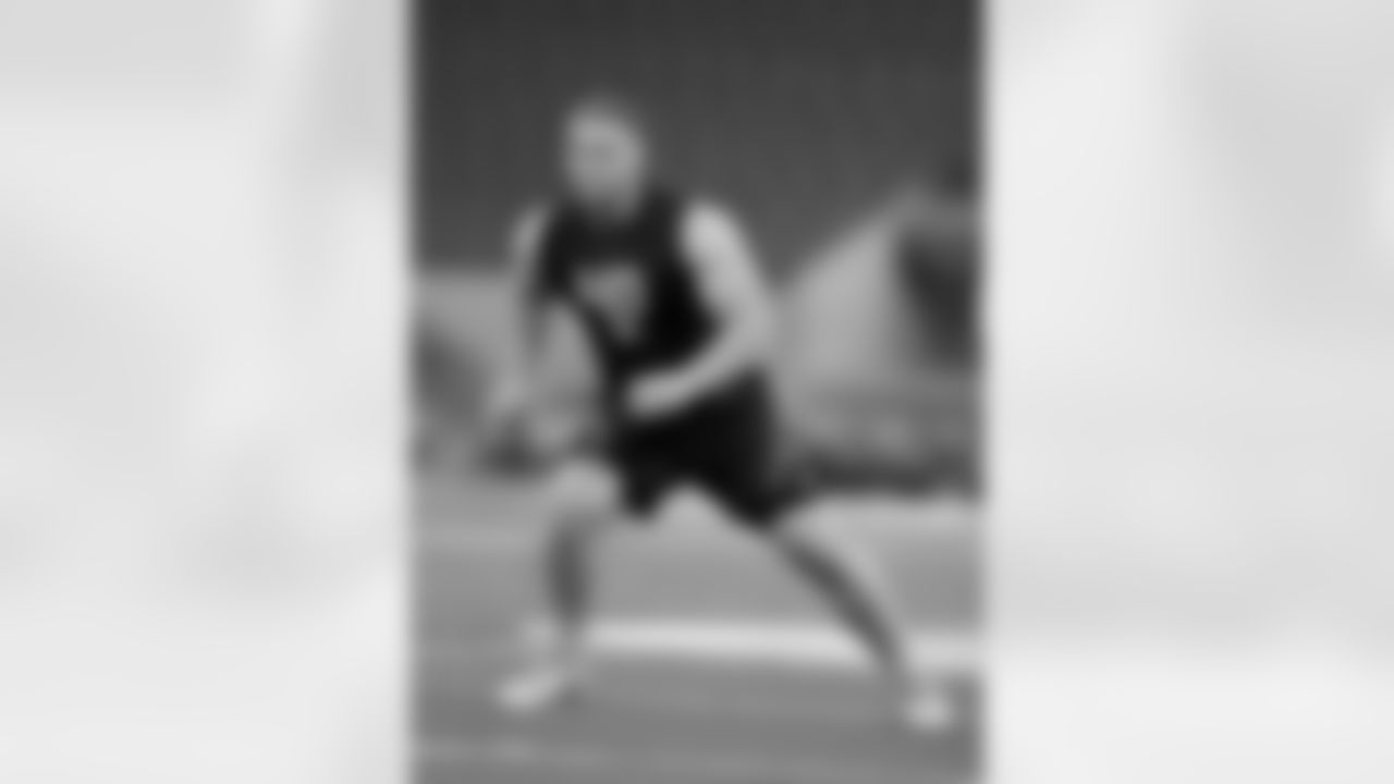 Auburn offensive lineman Braden Smith runs a drill during the NFL football scouting combine, Friday, March 2, 2018, in Indianapolis. (AP Photo/Darron Cummings)