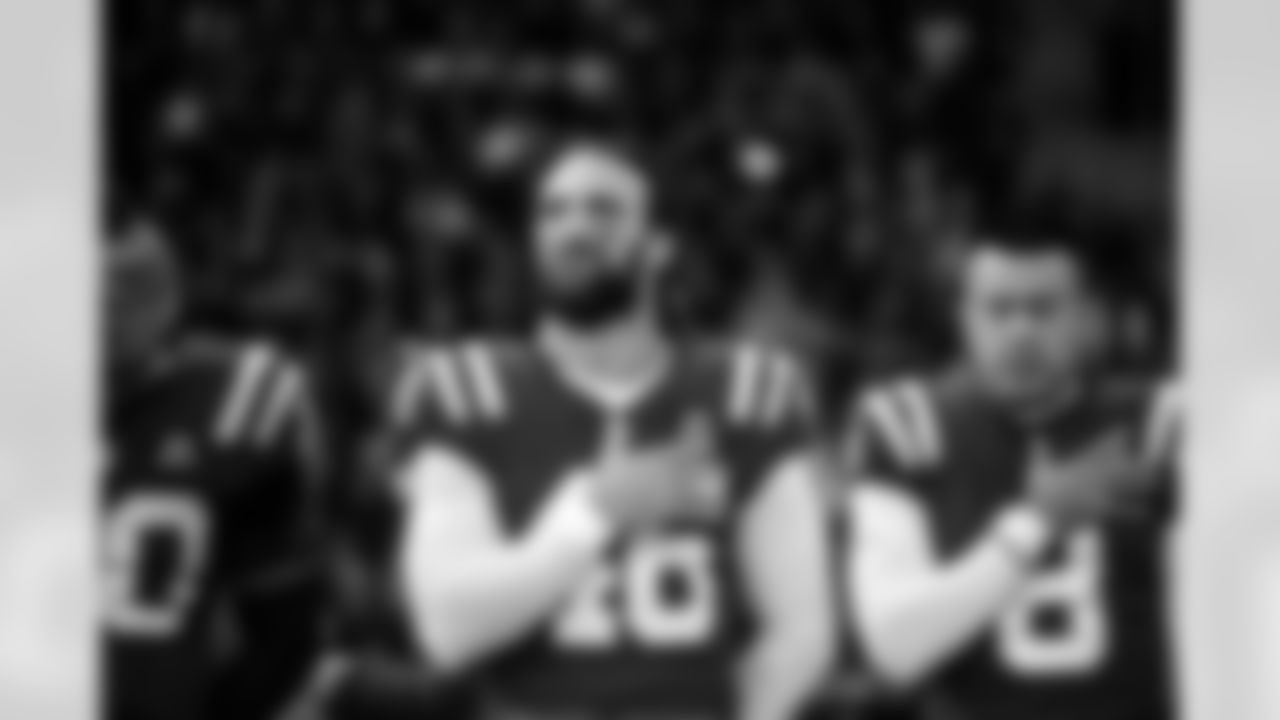 LS Luke Rhodes #46 and P Rigoberto Sanchez #8