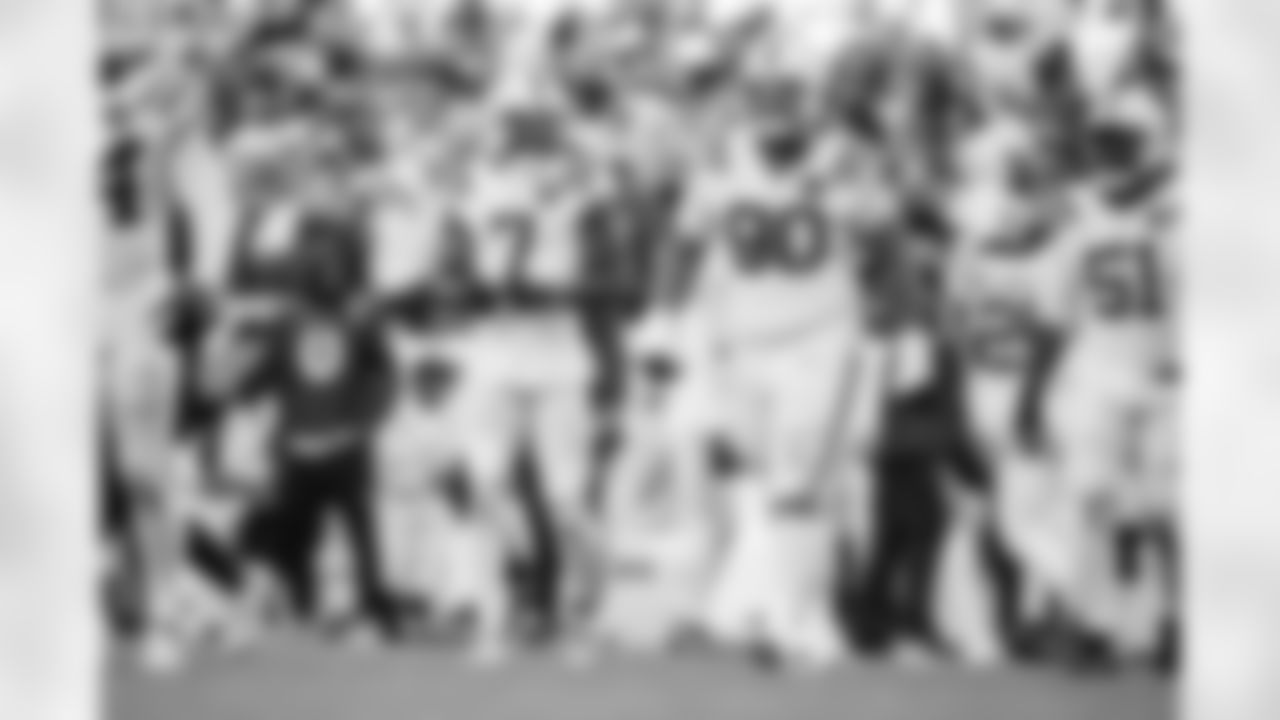 DT Grover Stewart #90 and DE Kwity Paye #51