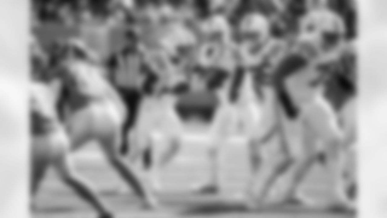 RB DJ Giddens #21 and QB Anthony Richardson #5