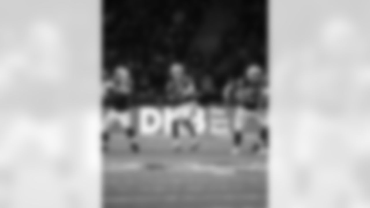 T Braden Smith #72, QB Daniel Jones #17 and G Tanor Bortolini #60