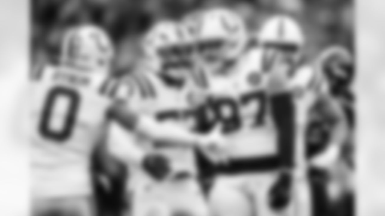 S Camryn Bynum #0, LB Germaine Pratt #53, DE Laiatu Latu #97 and DE JT Tuimoloau #91