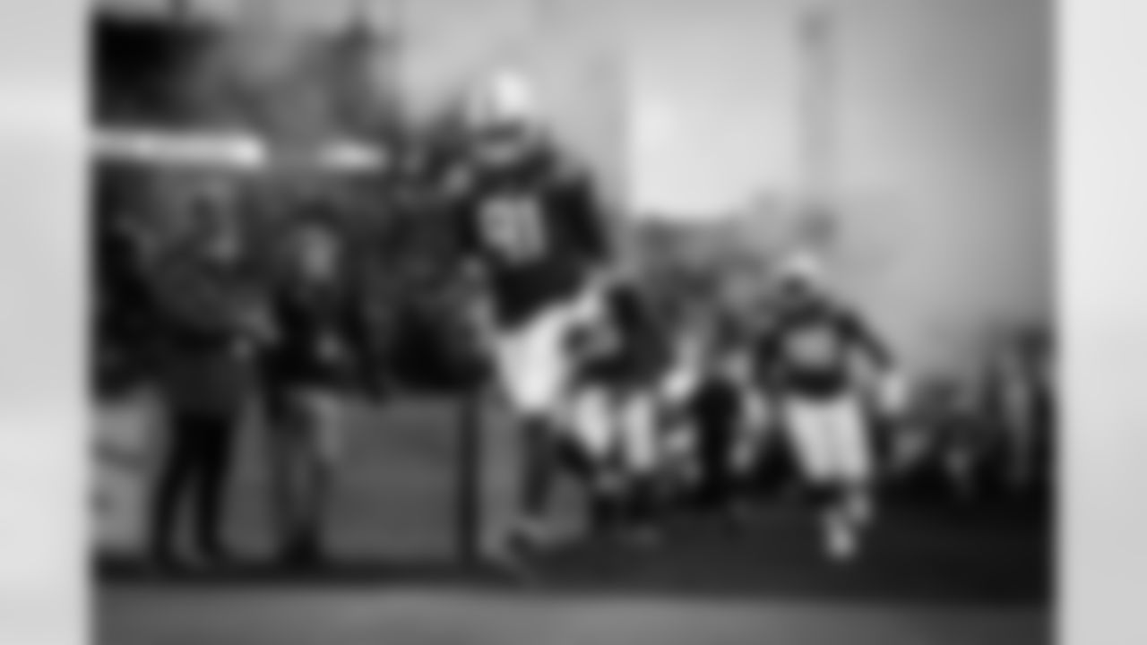 DE JT Tuimoloau #91 and DT Eric Johnson II #98