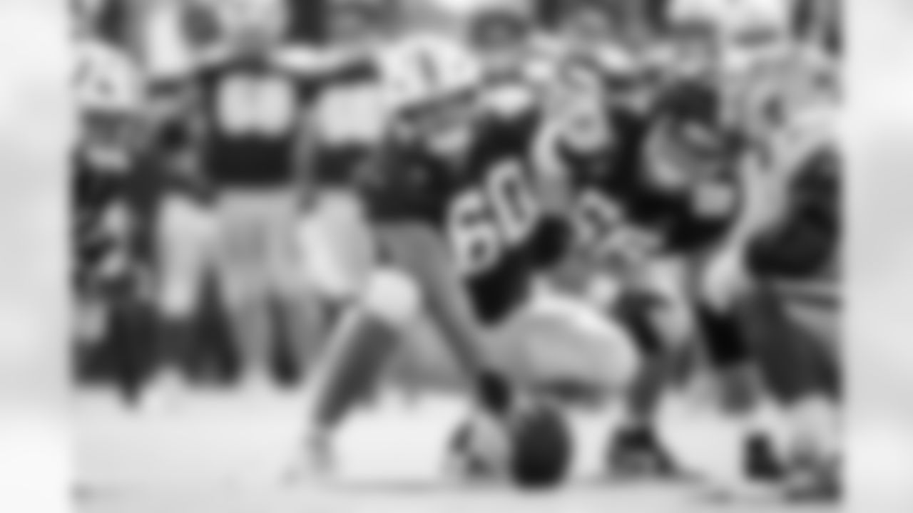 G Tanor Bortolini #60 and G Quenton Nelson #56