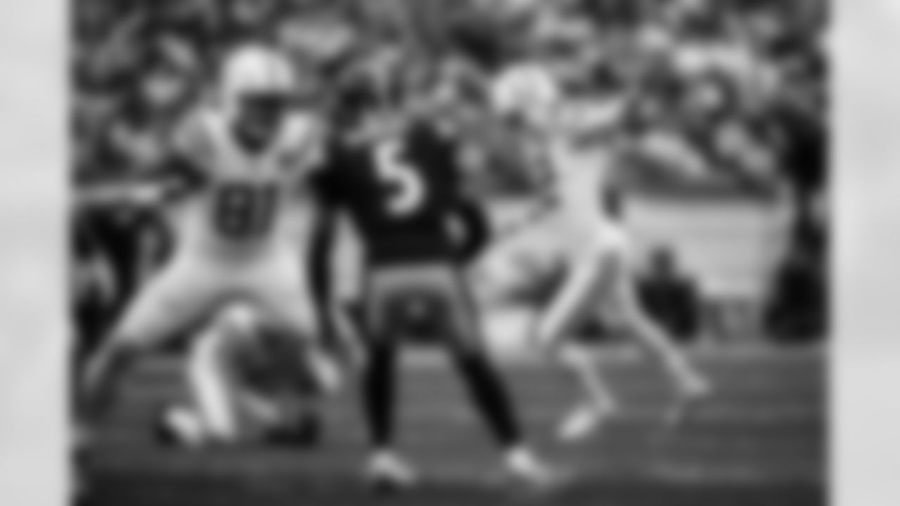 TE Mo Alie-Cox #81 and K Michael Badgley #12