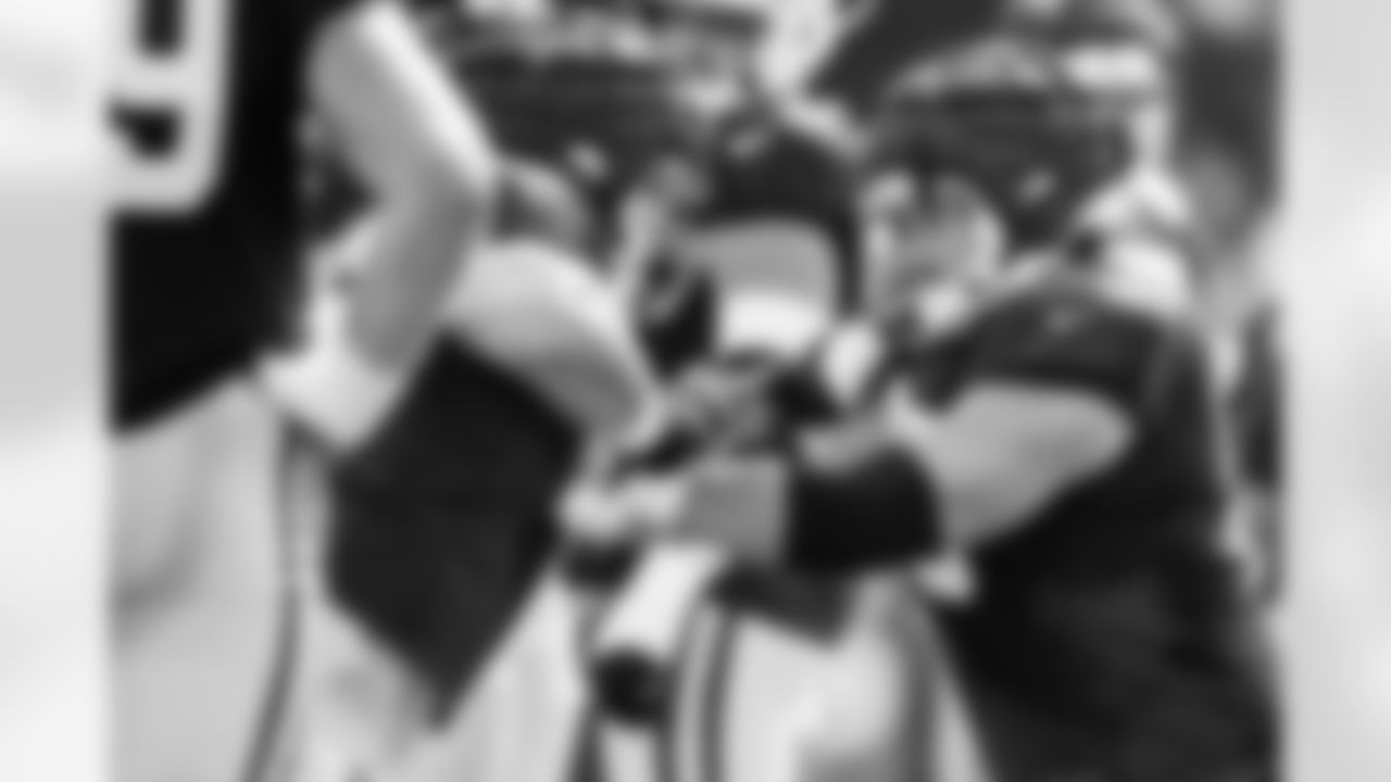 G Tanor Bortolini #60 and G Quenton Nelson #56