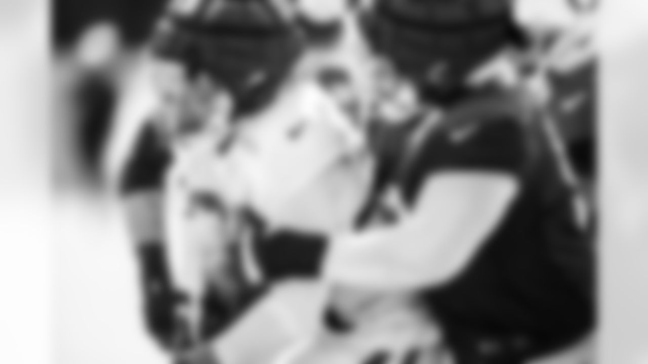 RB Jonathan Taylor #28 and DT Grover Stewart #90