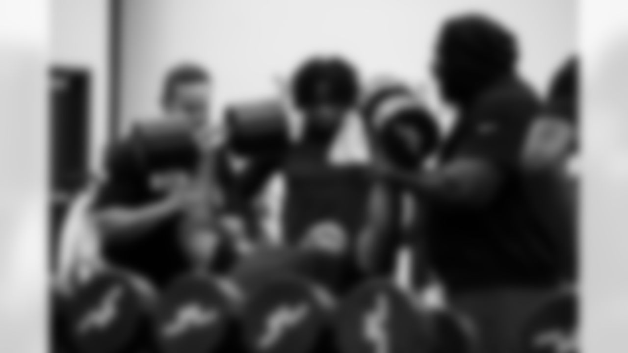 Mike Minnis Director of Sports Performance, DT Grover Stewart #90, CB Kenny Moore II #23 and DT Neville Gallimore #92