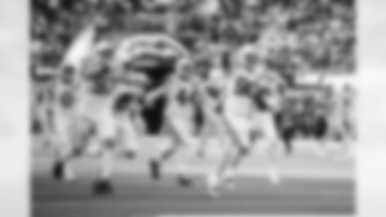 S Camryn Bynum #0, DE Laiatu Latu #97, DE Kwity Paye #51, LB Zaire Franklin #44 and DT Grover Stewart #90