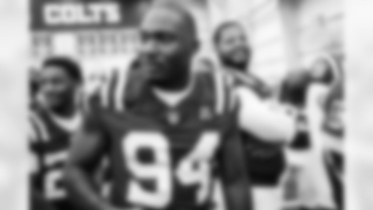 DE Tyquan Lewis #94 and DT Grover Stewart #90