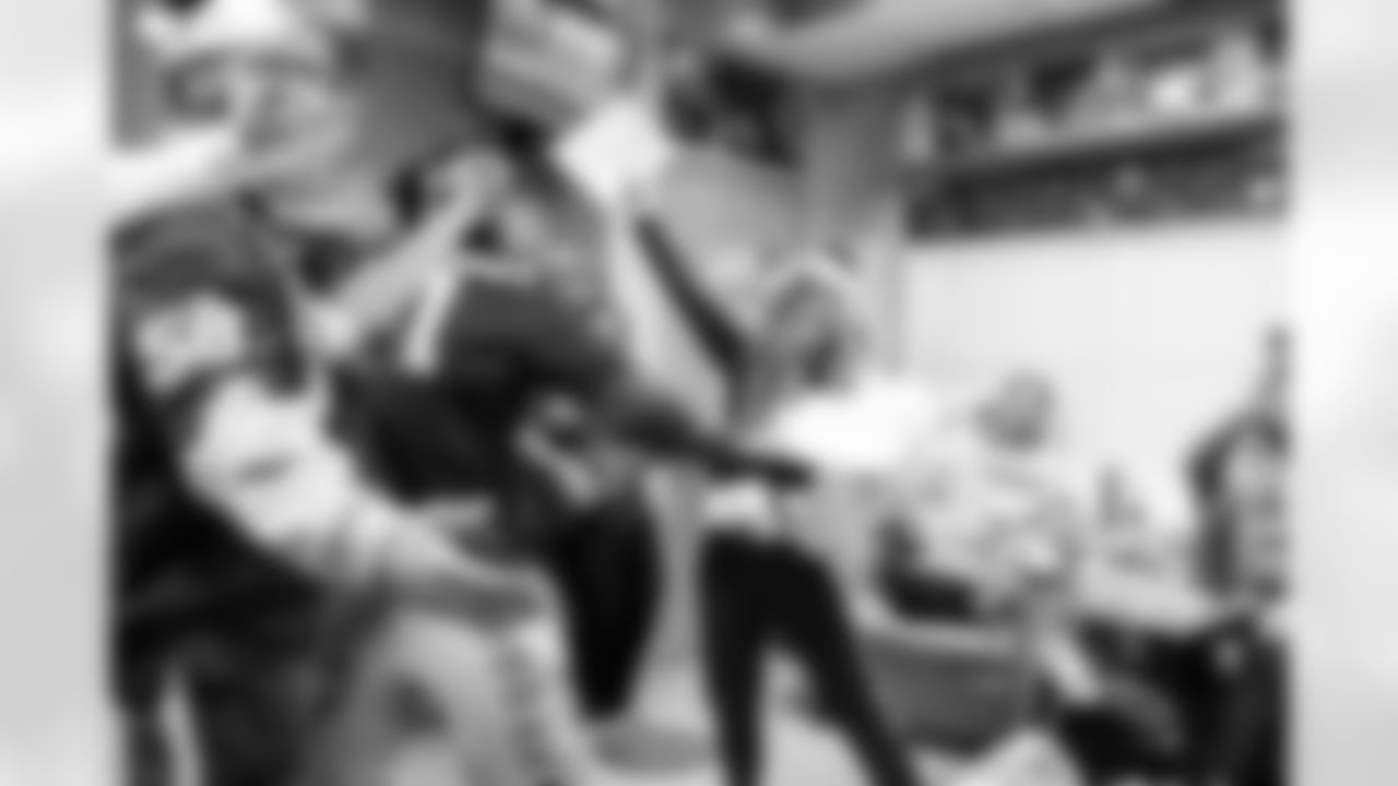 LB Austin Ajiake #58, DE Viliami Fehoko Jr. #96 and Allison B.