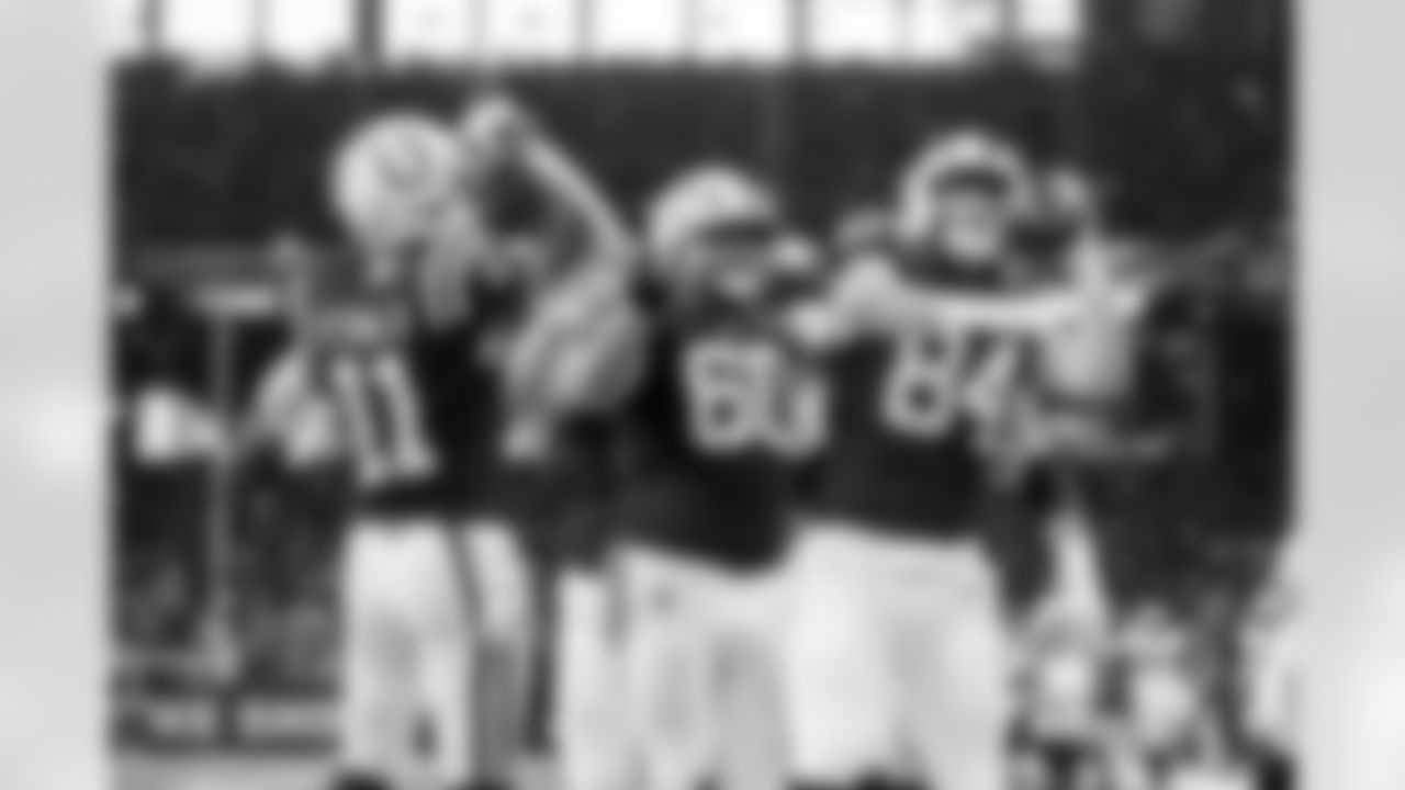 WR Michael Pittman Jr. #11, G Tanor Bortolini #60 and TE Tyler Warren #84