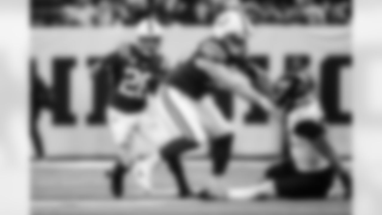 RB Jonathan Taylor #28 and T Bernhard Raimann #79