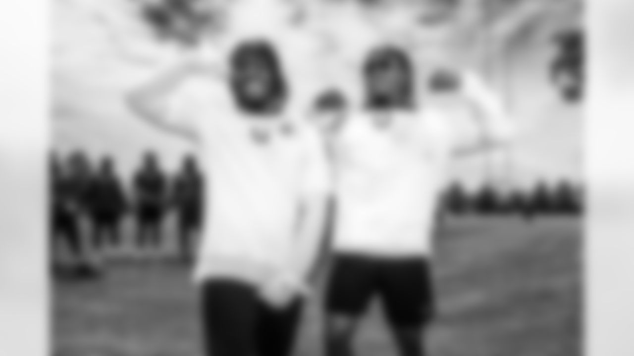 RB Tyler Goodson #31 and RB Jonathan Taylor #28
