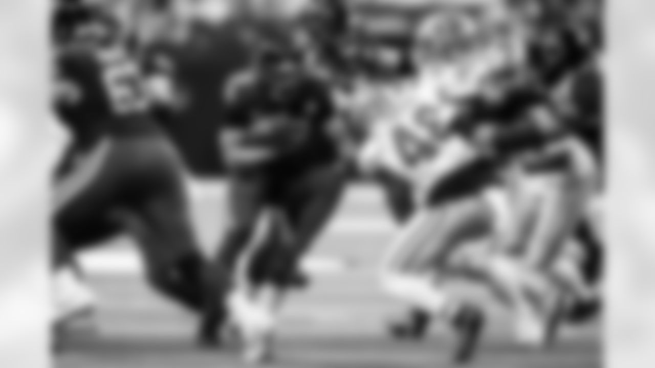 RB Jonathan Taylor #28 and G Matt Goncalves #71