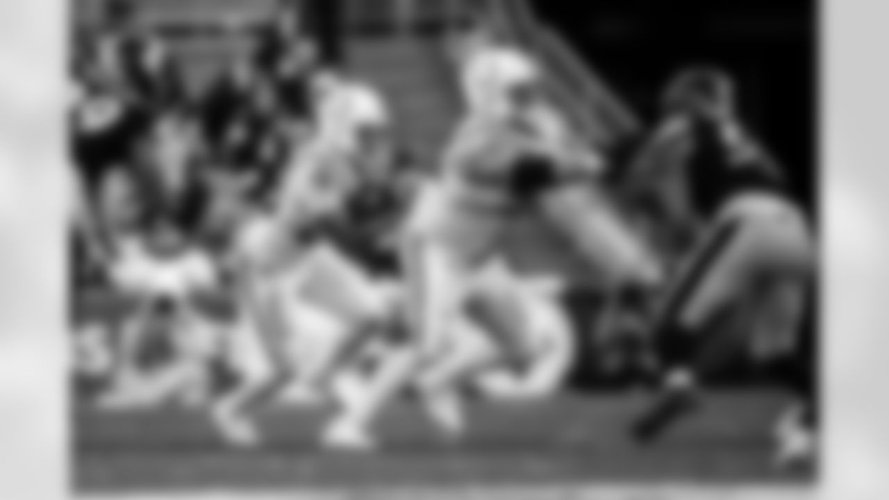 RB Jonathan Taylor #28 and G Quenton Nelson #56