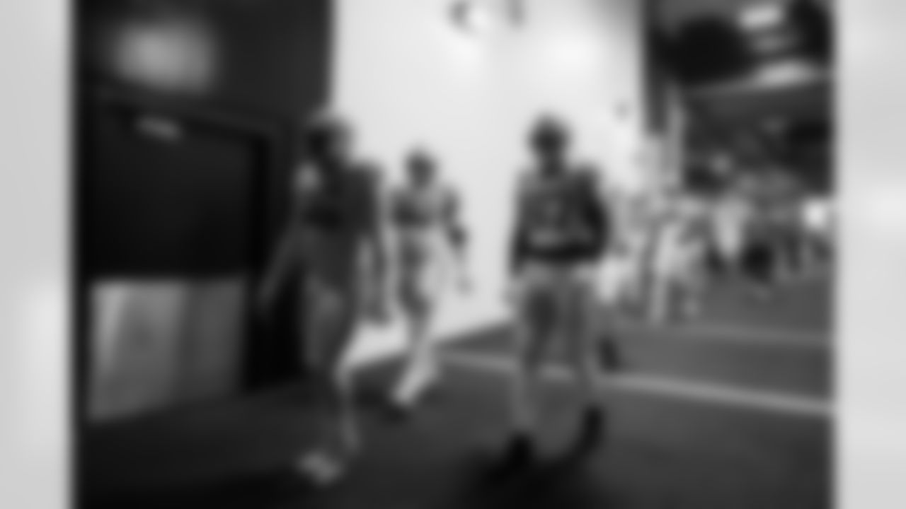 DT Adetomiwa Adebawore #95, C Tanor Bortolini #60 and DE Laiatu Latu #97