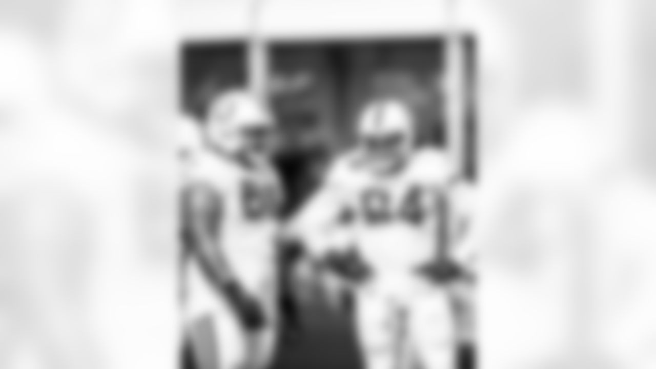 DT Josh Tupou #69 and LB Zaire Franklin #44
