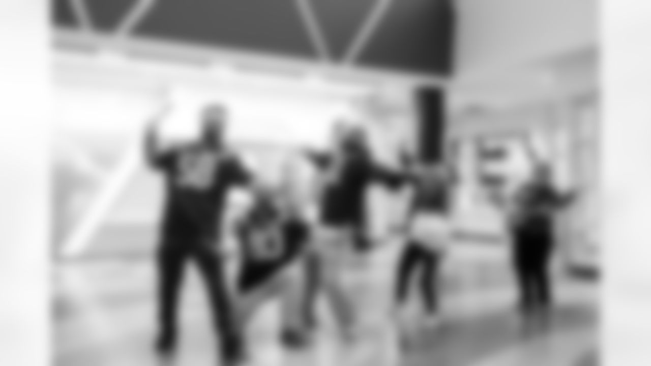 LB Austin Ajiake #58, WR Eli Pancol#83, DE Viliami Fehoko Jr.#61 and Allison B.