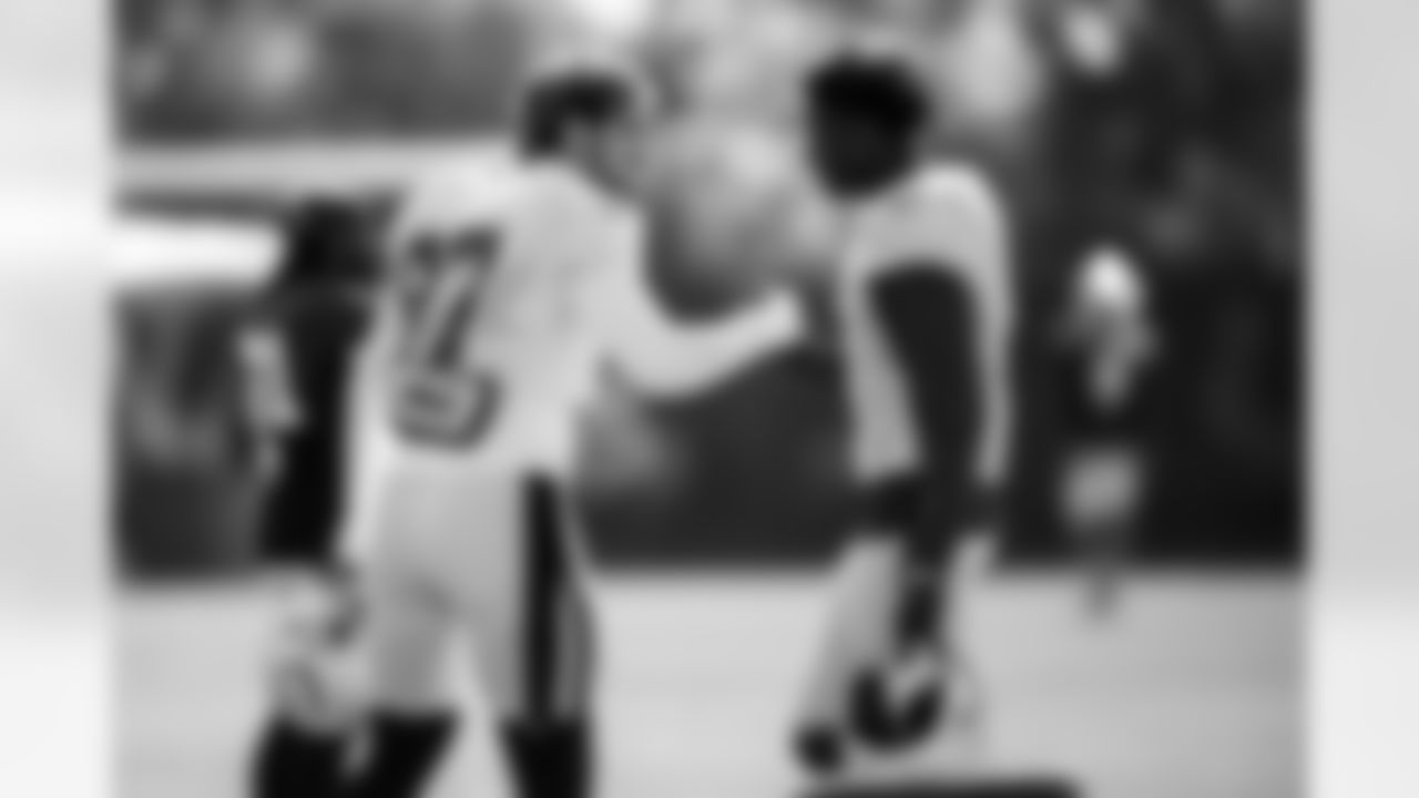 DE Laiatu Latu #97 and CB Sauce Gardner #1