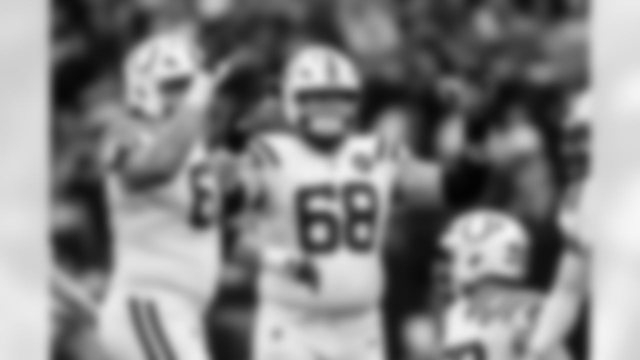 G Tanor Bortolini #60 and G Dalton Tucker #68