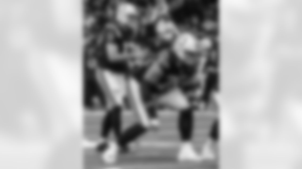 QB Philip Rivers #17 and T Jalen Travis #75