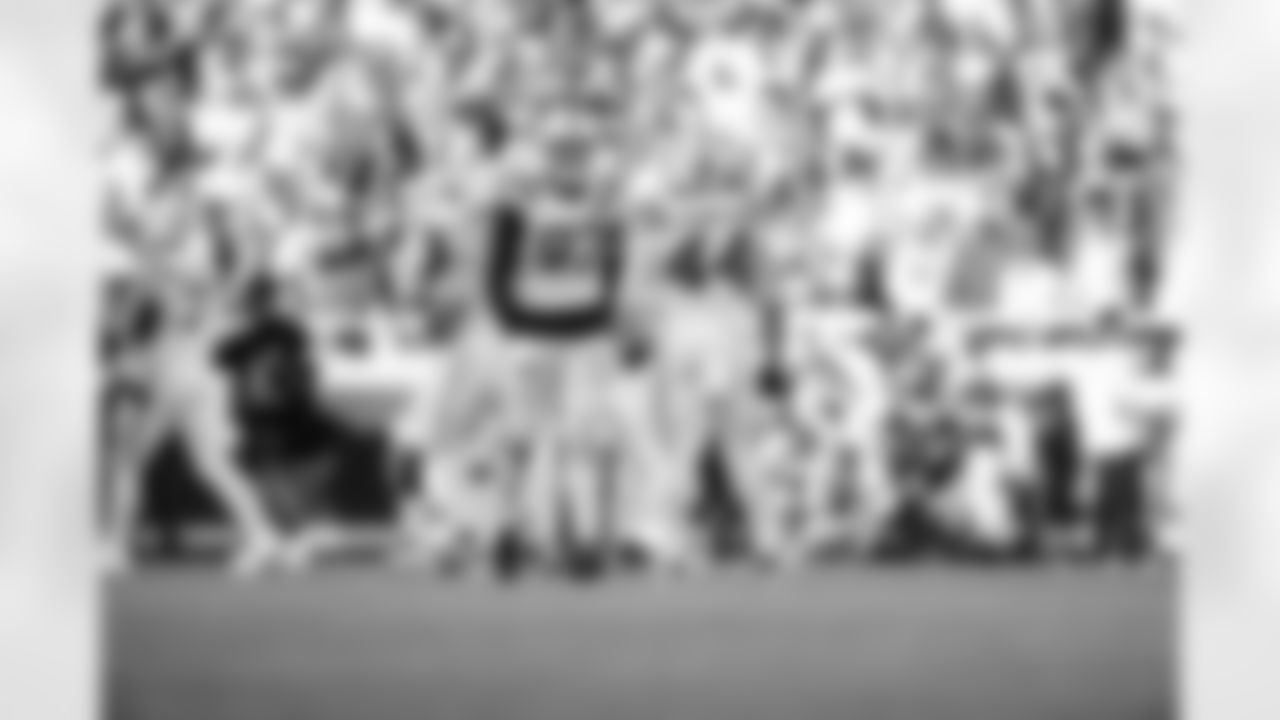 DE Laiatu Latu #97 and LB Zaire Franklin #44