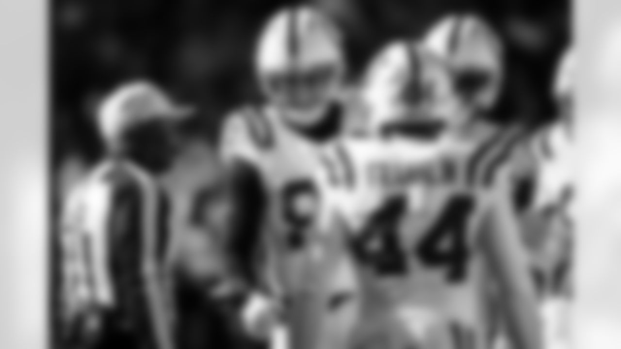 DE Laiatu Latu #97 and LB Zaire Franklin #44