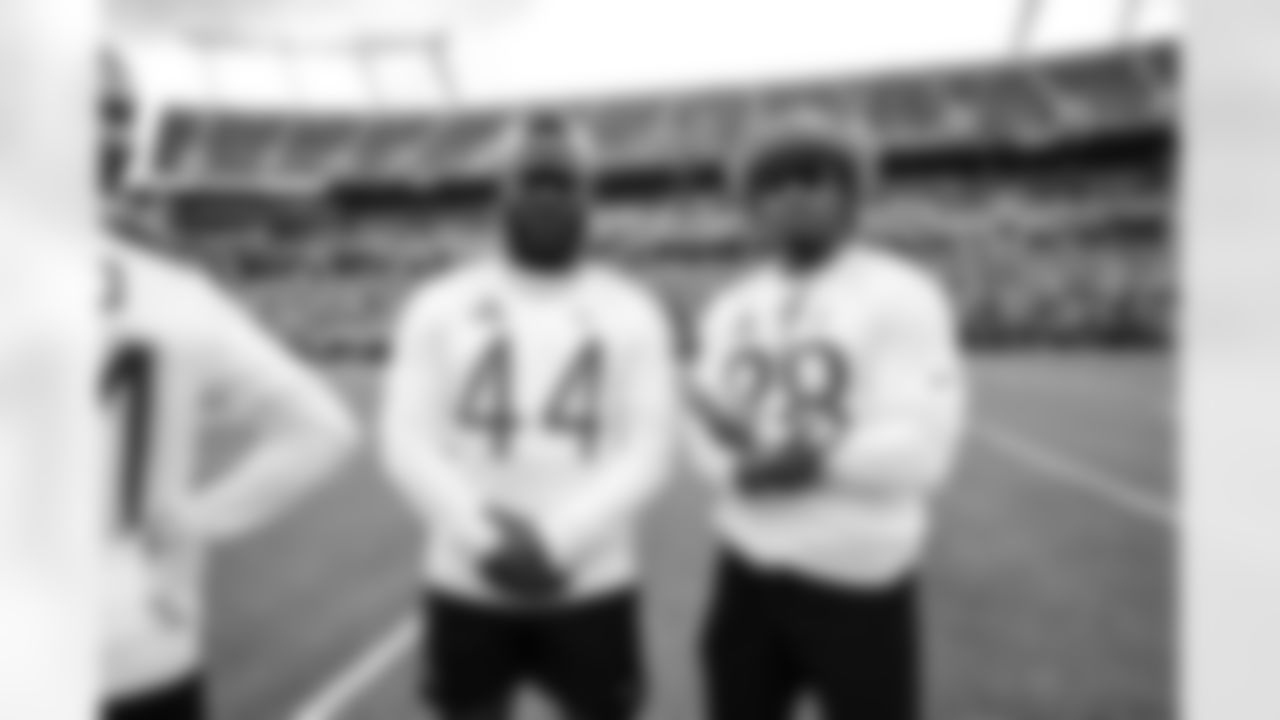 LB Zaire Franklin #44 and RB Jonathan Taylor #28