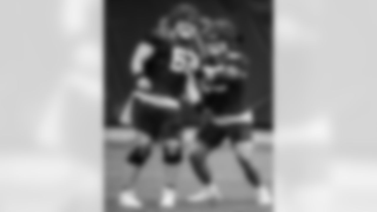 C Wesley French #62 and C Mose Vavao #67