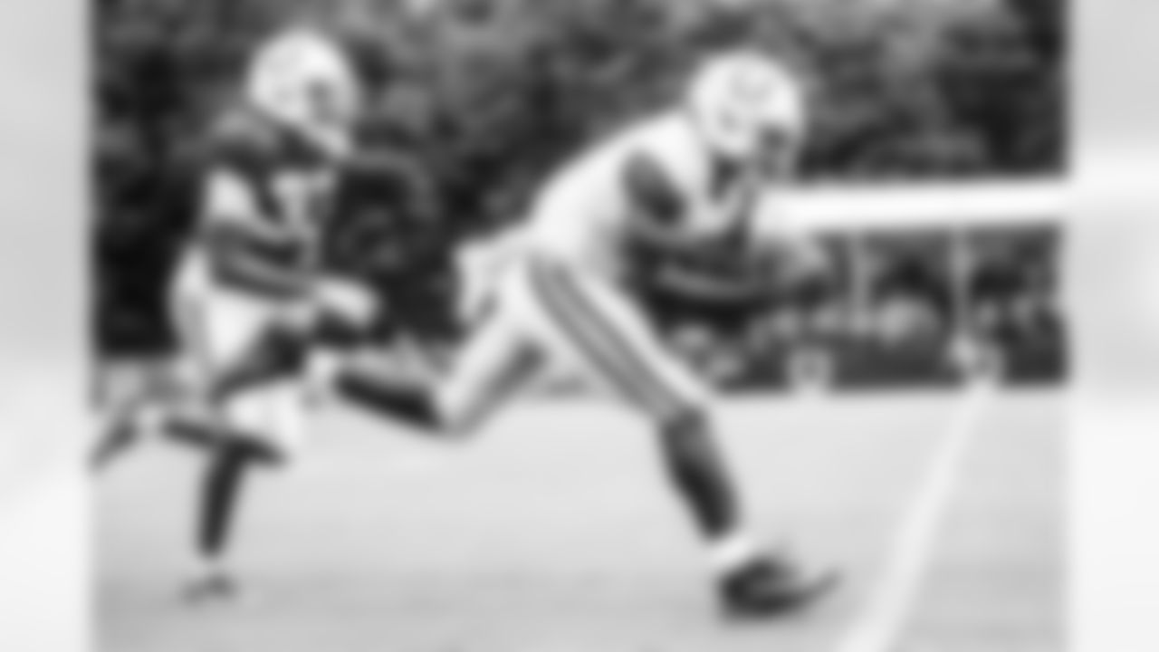 WR Ashton Dulin #16 and CB Samuel Womack III #33