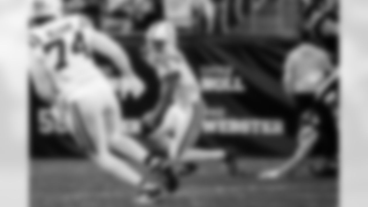 DE Durell Nchami #74 and WR Josh Downs #1