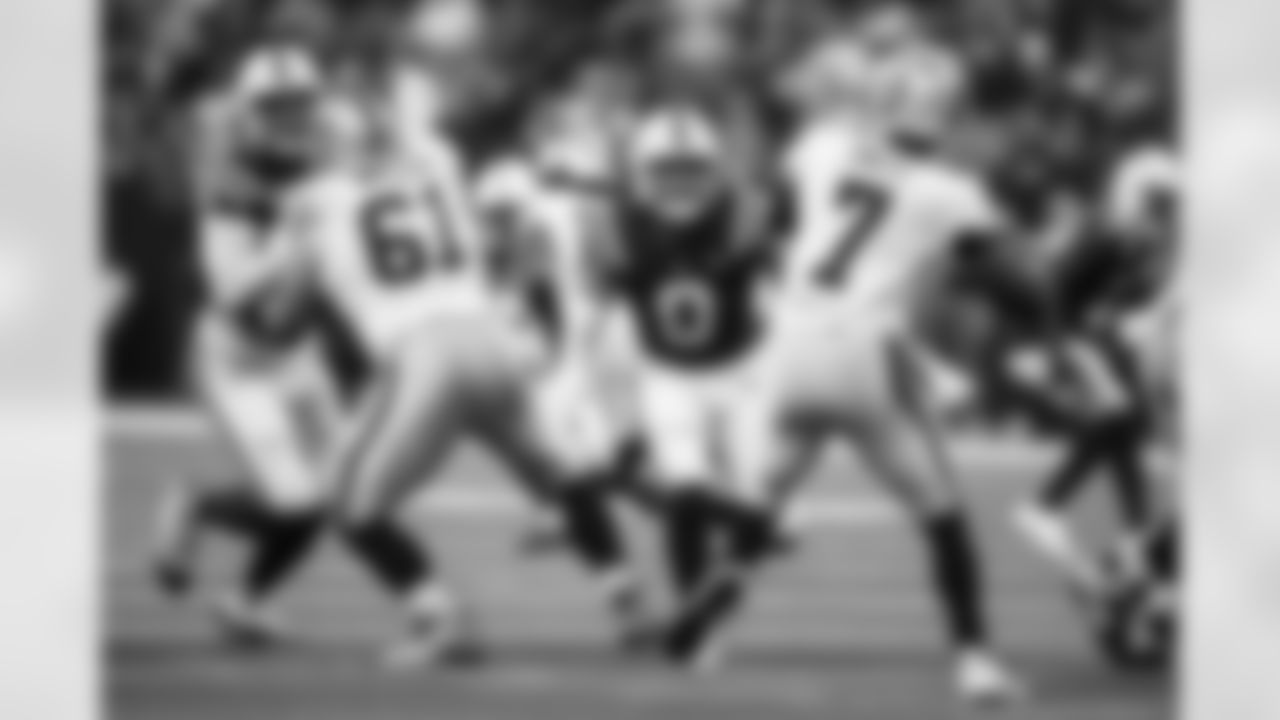 DT DeForest Buckner #99 and S Camryn Bynum #0