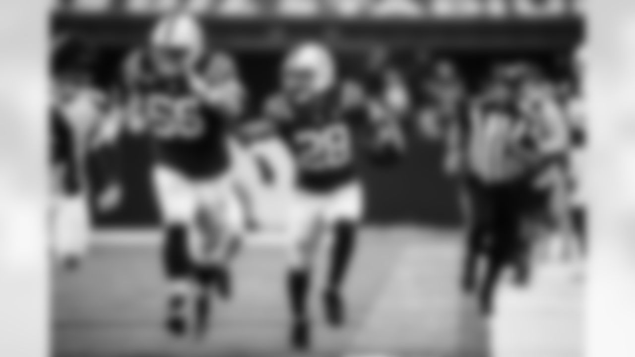 G Quenton Nelson #56 and RB Jonathan Taylor #28