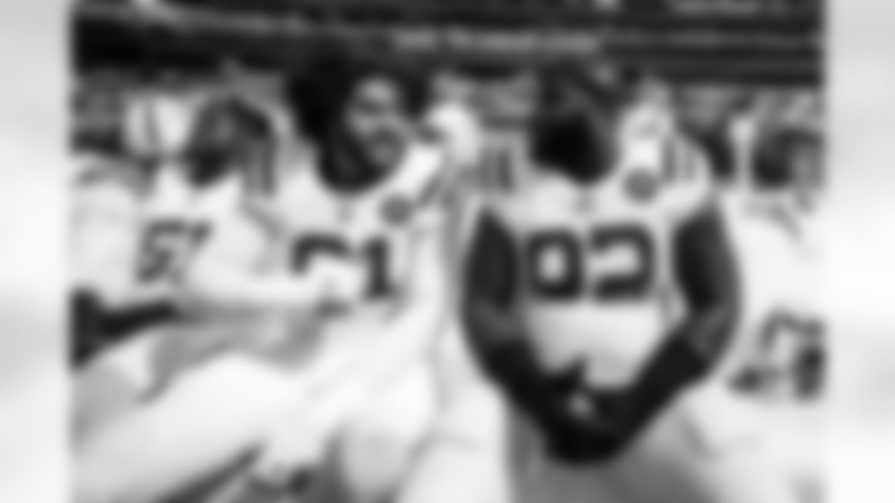 DE Kwity Paye #51, DE JT Tuimoloau #91 and DT Neville Gallimore #92