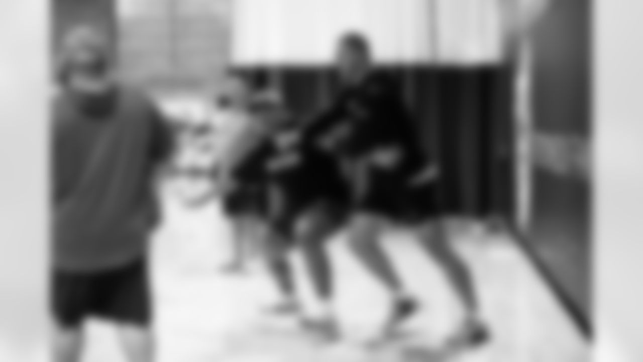 G Atonio Mafi #65 and TJack Wilson#76