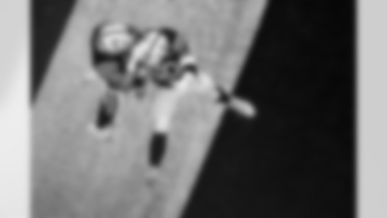 OL Tanor Bortolini #60 and TE Tyler Warren #84