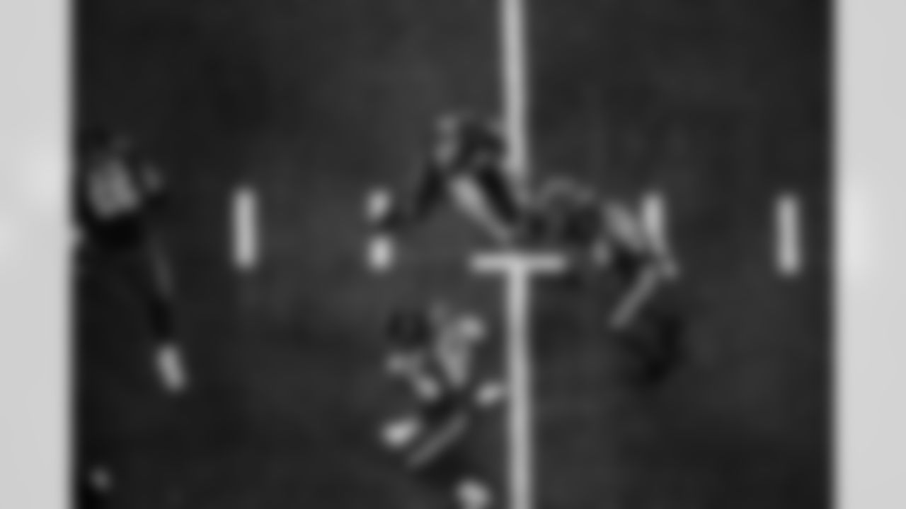 TE Tyler Warren #84, RB Jonathan Taylor #28 and QB Philip Rivers #17