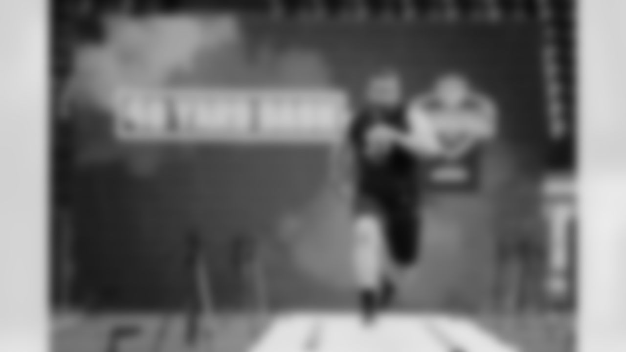 Ball State offensive lineman Danny Pinter runs the 40-yard dash at the NFL football scouting combine in Indianapolis, Friday, Feb. 28, 2020. (AP Photo/Charlie Neibergall)