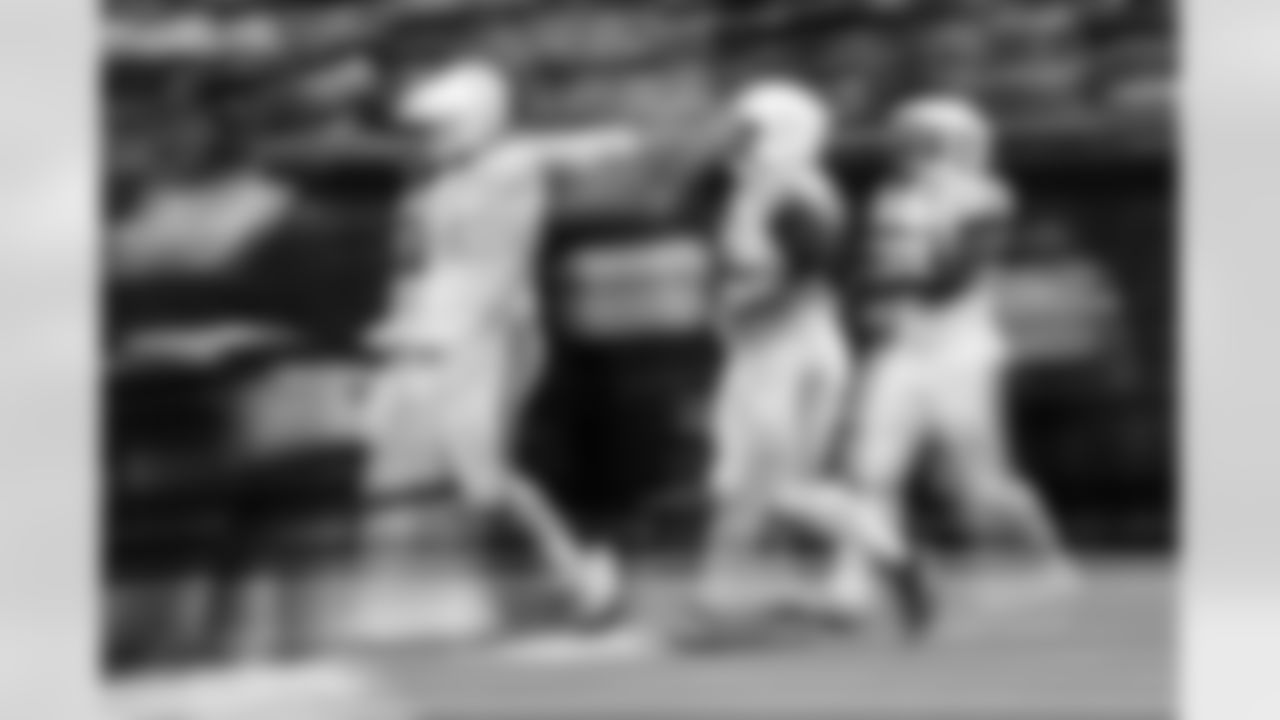 DT Grover Stewart #90, DT Neville Gallimore #92 and LB Germaine Pratt #53