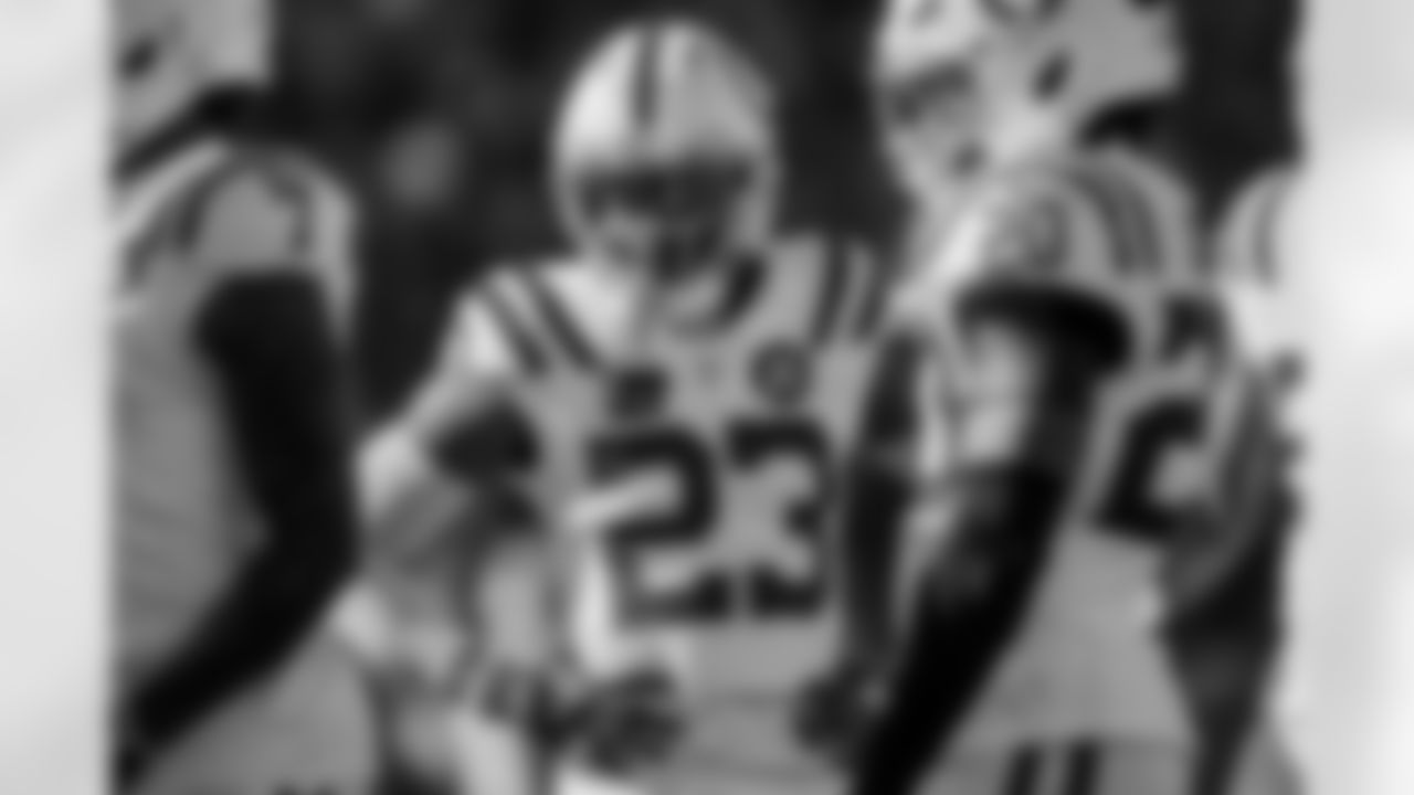 CB Kenny Moore II #23 and S Nick Cross #20