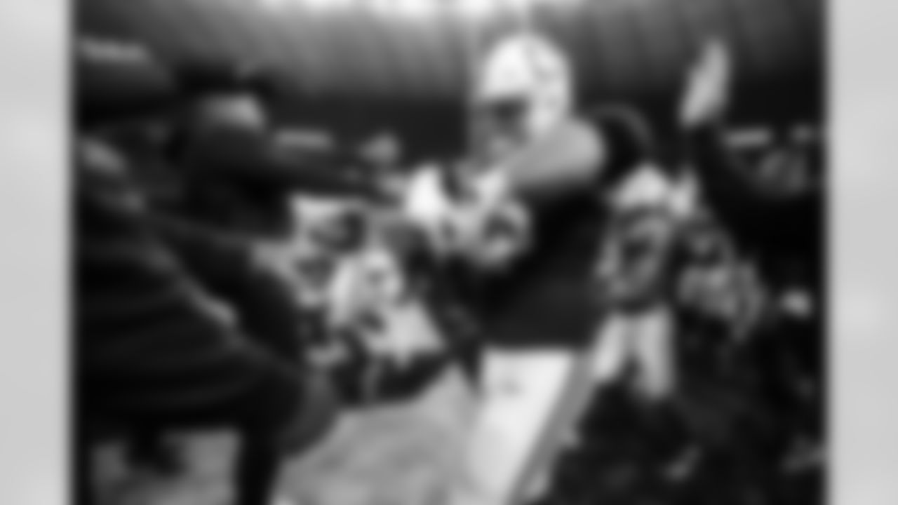 David Thornton Vice President of Team Engagement and G Quenton Nelson #56